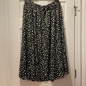 Size 3x SHEIN skirt. Flows well. Black and white polka dots.
